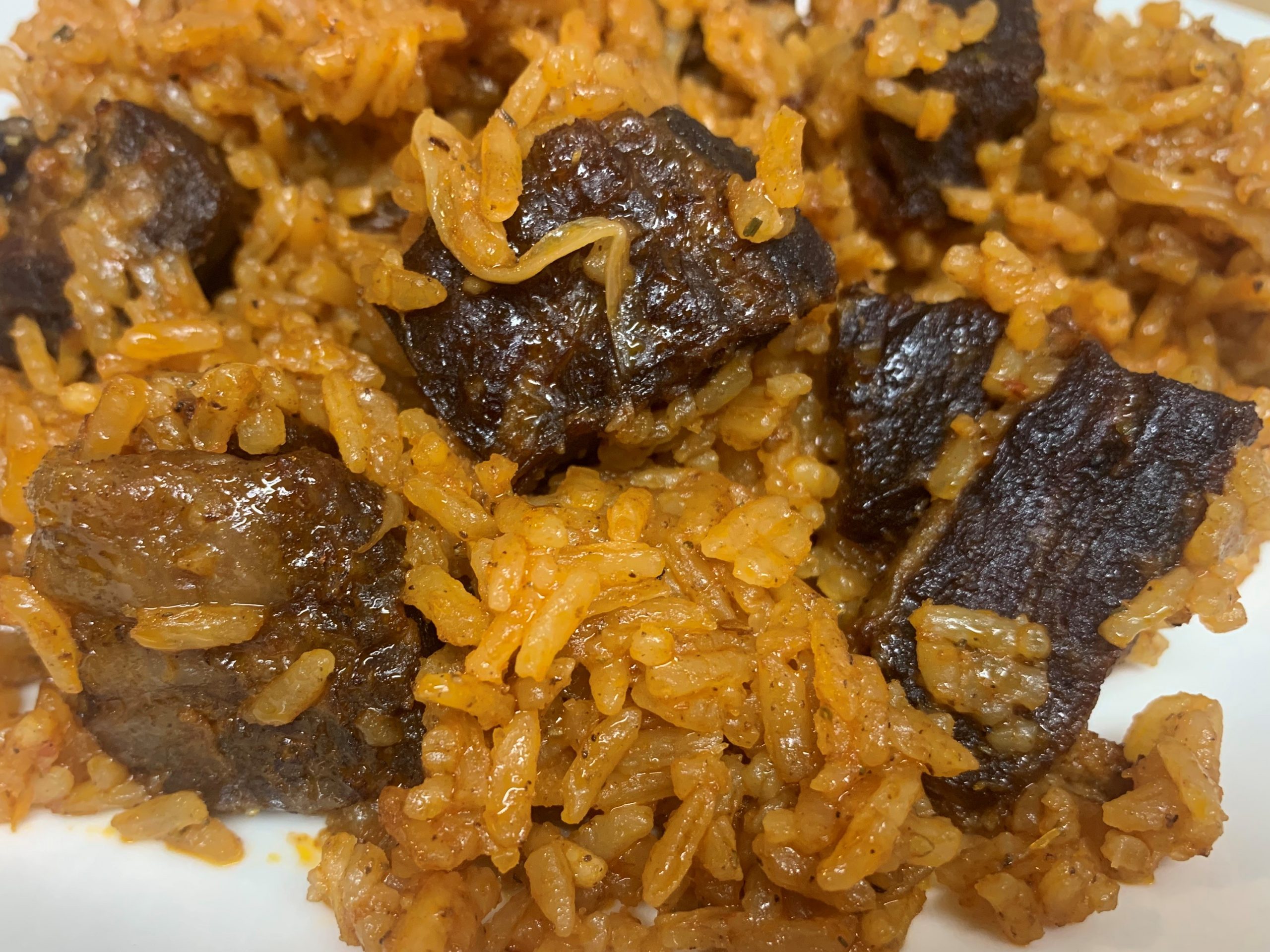 How To Make Flavorful Ghanaian Jollof Rice - The Foodi House